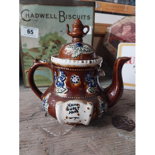 74 - 19th C. ceramic barge teapot. {19 cm H x 21 cm W x 13 cm D}.