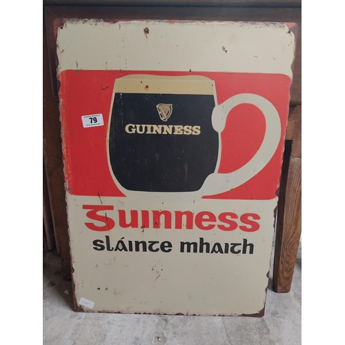 79 - Guinness tinplate bilingual advertising sign. {70 cm H x 50 cm W}.