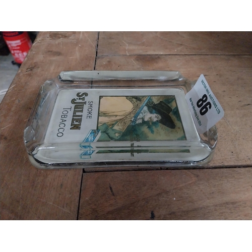 86 - Smoke St Julien Tobacco pictorial glass advertising ashtray. {3 cm H x 14 cm W x 9 cm D}.