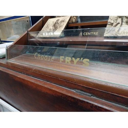 870 - 1970's Fry's Chocolate mahogany and glass counter display cabinet. {29 cm H x 60 cm W x 55 cm D}.