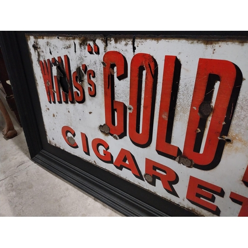 879 - Framed Wills's Gold Flake Cigarettes enamel advertising sign. {64 cm H x 153 cm W}.