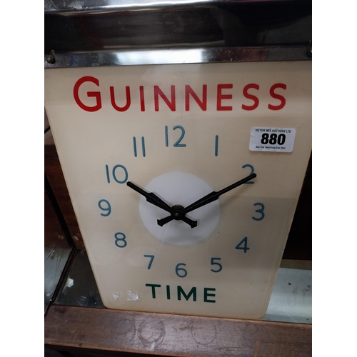 880 - Guinness chrome and Perspex hanging battery advertising clock. {42 cm H x 44 cm W}.