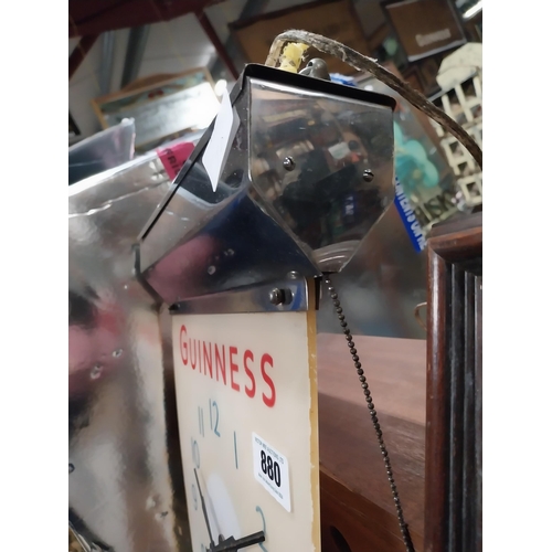 880 - Guinness chrome and Perspex hanging battery advertising clock. {42 cm H x 44 cm W}.