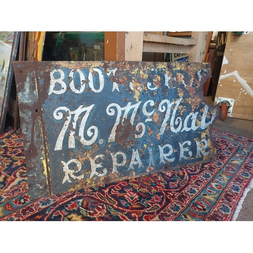 100A - Early 20th C. McNally Boot & Shoe repairer enamel advertising sign {38 cm H x 66 cm W}.