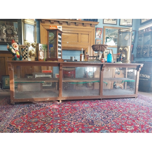 150A - Early 20th C. painted pine shop counter with glass panels {85 cm H x 275 cm W x 62 cm D}.