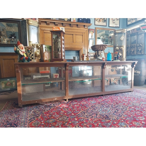 150A - Early 20th C. painted pine shop counter with glass panels {85 cm H x 275 cm W x 62 cm D}.