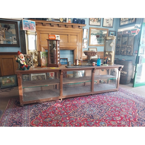 150A - Early 20th C. painted pine shop counter with glass panels {85 cm H x 275 cm W x 62 cm D}.