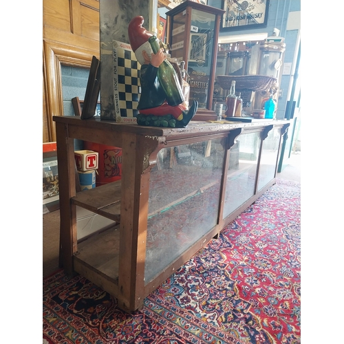 150A - Early 20th C. painted pine shop counter with glass panels {85 cm H x 275 cm W x 62 cm D}.