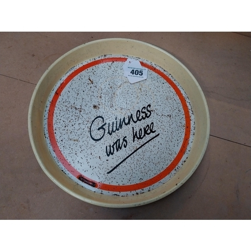 405 - Two Guinness tinplate advertising trays. {30 cm Dia.}.