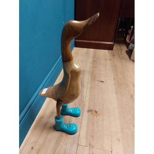 117 - Carved hardwood model of a Duck. {64 cm H x 23 cm W x 23 cm D].