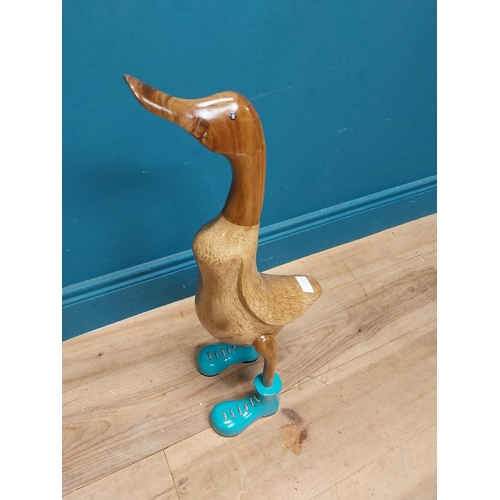 117 - Carved hardwood model of a Duck. {64 cm H x 23 cm W x 23 cm D].