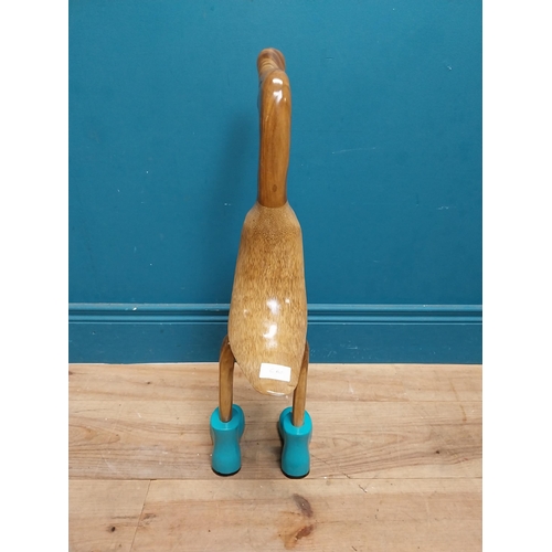 117 - Carved hardwood model of a Duck. {64 cm H x 23 cm W x 23 cm D].