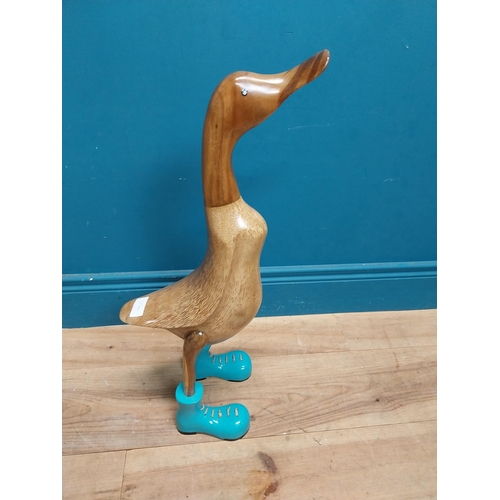 117 - Carved hardwood model of a Duck. {64 cm H x 23 cm W x 23 cm D].