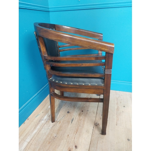 118 - Mahogany and leather office chair with brass studs {86 cm H x 60 cm W x 54 cm D}.