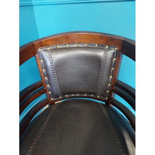 118 - Mahogany and leather office chair with brass studs {86 cm H x 60 cm W x 54 cm D}.