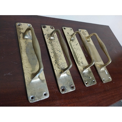 124 - Set of four brass door handles {30 cm H x 6 cm W x 7 cm D }.