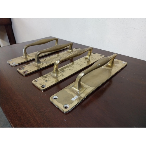 124 - Set of four brass door handles {30 cm H x 6 cm W x 7 cm D }.