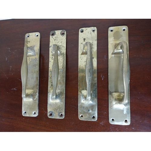 124 - Set of four brass door handles {30 cm H x 6 cm W x 7 cm D }.