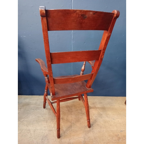 129 - Late 19th. C. elm open armchair with slat back { 107cm H X 58cm W X 48cm D }.