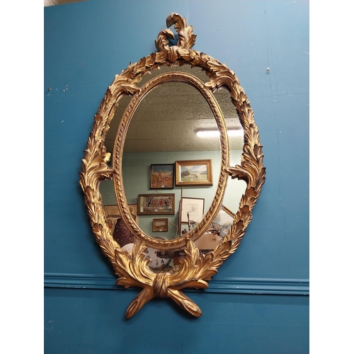 133 - Good quality gilt wall mirror in the Rococco style. {132 cm W x 70 cm W}.