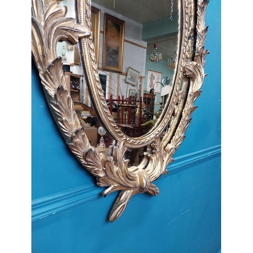 133 - Good quality gilt wall mirror in the Rococco style. {132 cm W x 70 cm W}.