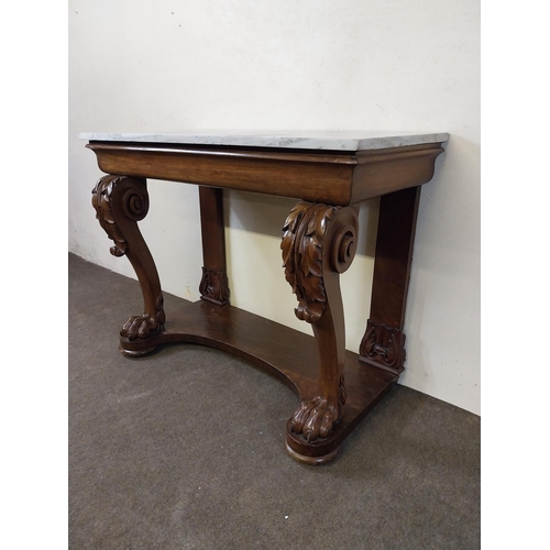 134 - William IV mahogany side table with marble top raised on carved cabriole legs and lions paw feet and... 