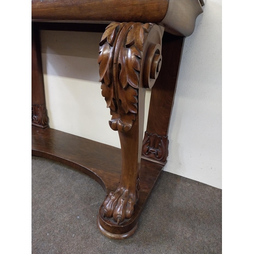 134 - William IV mahogany side table with marble top raised on carved cabriole legs and lions paw feet and... 