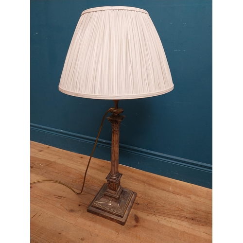 141 - Good quality 19th C. silver plate corinthian column table lamp with cloth shade originally from Lutt... 