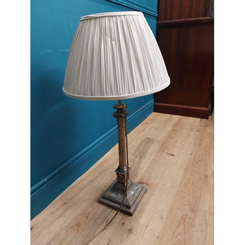 141 - Good quality 19th C. silver plate corinthian column table lamp with cloth shade originally from Lutt... 