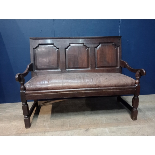 147 - Georgian oak settle bench with panelled back and leather upholstered seat. { 103cm H X 137cm W X 55c... 