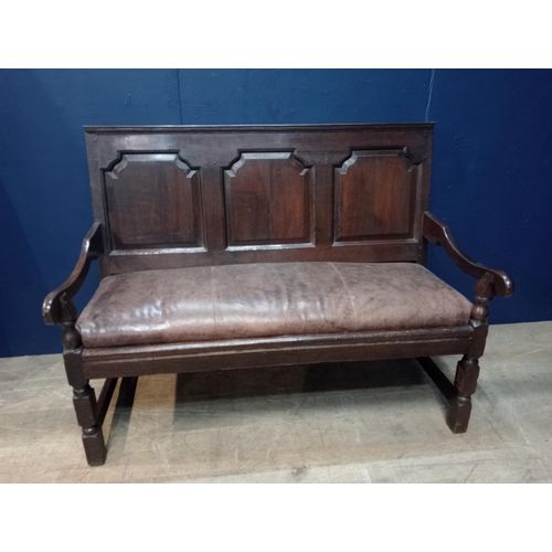 147 - Georgian oak settle bench with panelled back and leather upholstered seat. { 103cm H X 137cm W X 55c... 