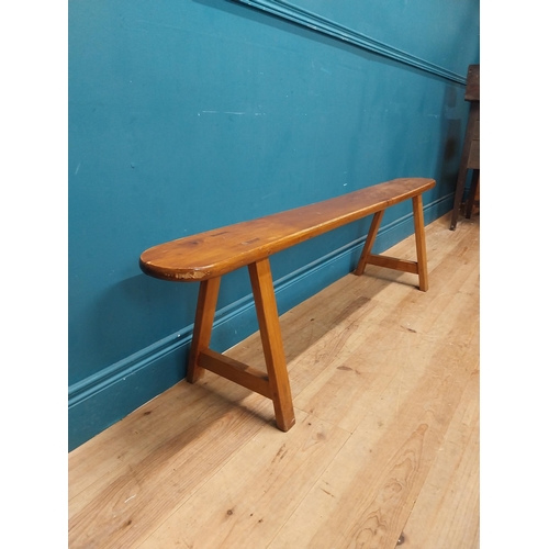 15 - Pair of 19th C. fruitwood kitchen benches raised on splayed legs {45 cm H x 160 cm W x 34 cm D}.