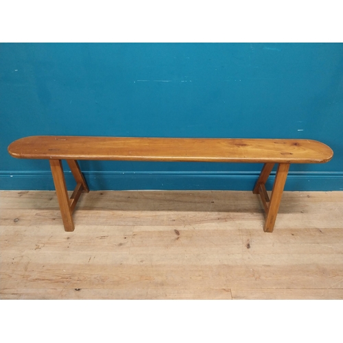 15 - Pair of 19th C. fruitwood kitchen benches raised on splayed legs {45 cm H x 160 cm W x 34 cm D}.