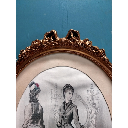 153 - Coloured print Two Ladies monted in a decorative oval frame. { 58cm H X 43cm W }.