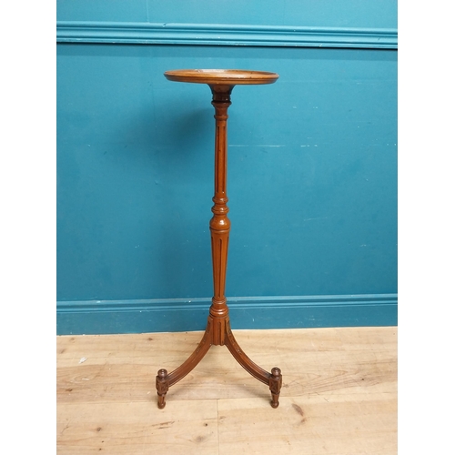 154 - 19th C. mahogany jardinere stand on reeded column and three outswept feet. {92 cm H x 38 cm Dia.}.