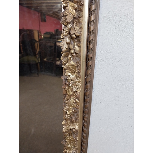 161 - Decorative gilt wall mirror {113 cm H x 83 cm W x 8 cm D}.