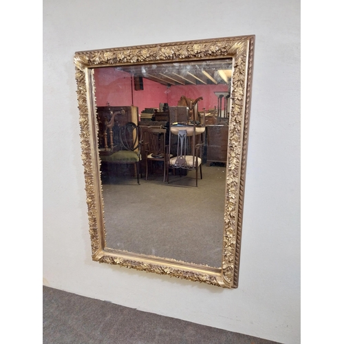 161 - Decorative gilt wall mirror {113 cm H x 83 cm W x 8 cm D}.