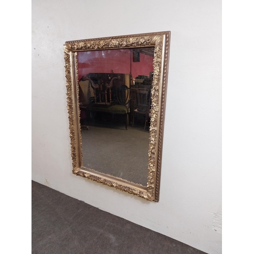 161 - Decorative gilt wall mirror {113 cm H x 83 cm W x 8 cm D}.