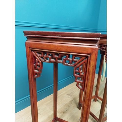 168 - Pair of Oriental hardwood plant stands raised on square legs {92 cm H x 33 cm W x 33 cm D}.