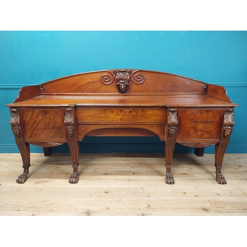 170 - 19th C. Irish mahogany sideboard with carved gallery back raised on carved lions mask legs and lions... 