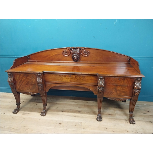 170 - 19th C. Irish mahogany sideboard with carved gallery back raised on carved lions mask legs and lions... 