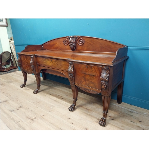 170 - 19th C. Irish mahogany sideboard with carved gallery back raised on carved lions mask legs and lions... 