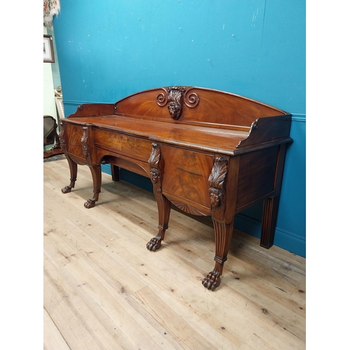 170 - 19th C. Irish mahogany sideboard with carved gallery back raised on carved lions mask legs and lions... 