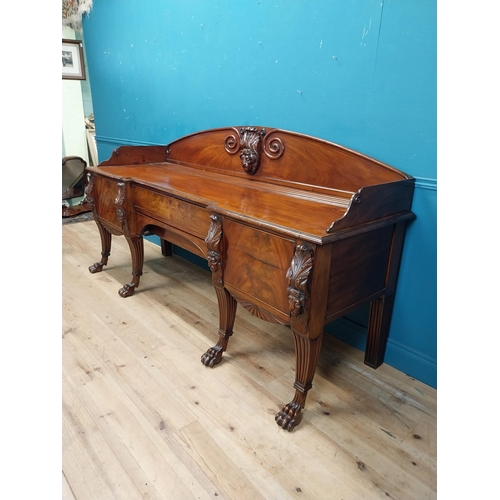 170 - 19th C. Irish mahogany sideboard with carved gallery back raised on carved lions mask legs and lions... 