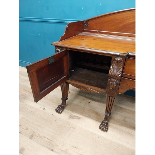 170 - 19th C. Irish mahogany sideboard with carved gallery back raised on carved lions mask legs and lions... 