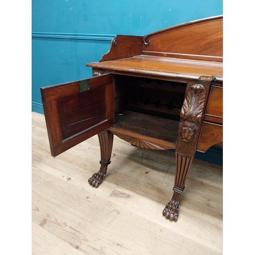 170 - 19th C. Irish mahogany sideboard with carved gallery back raised on carved lions mask legs and lions... 