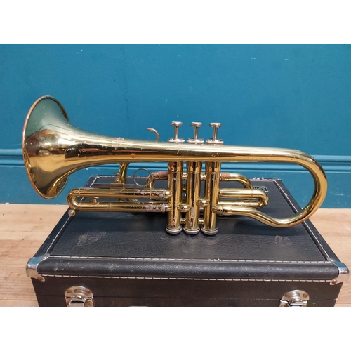 177 - Cased brass trumpet.