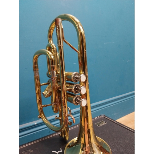 177 - Cased brass trumpet.