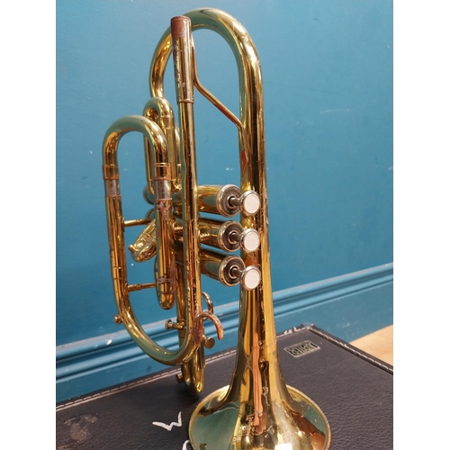 177 - Cased brass trumpet.