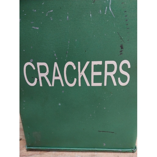 179 - Green painted metal Crackers lidded tin. {30 cm H x 24 cm W x 18 cm D}.